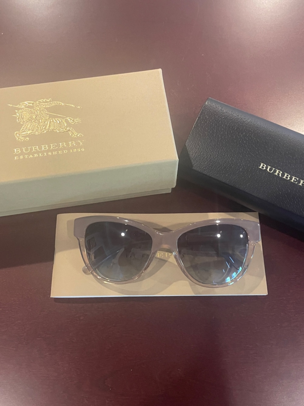 Burberry Translucent Gray Nude Frame Sunglasses with gradient Lenses